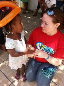 We went to an orphanage one day to do a program. This little girl held my hand and would not let go. I couldn't get away to do the dances and someone had to pull her away from me so I could go do puppets. She melted my heart.